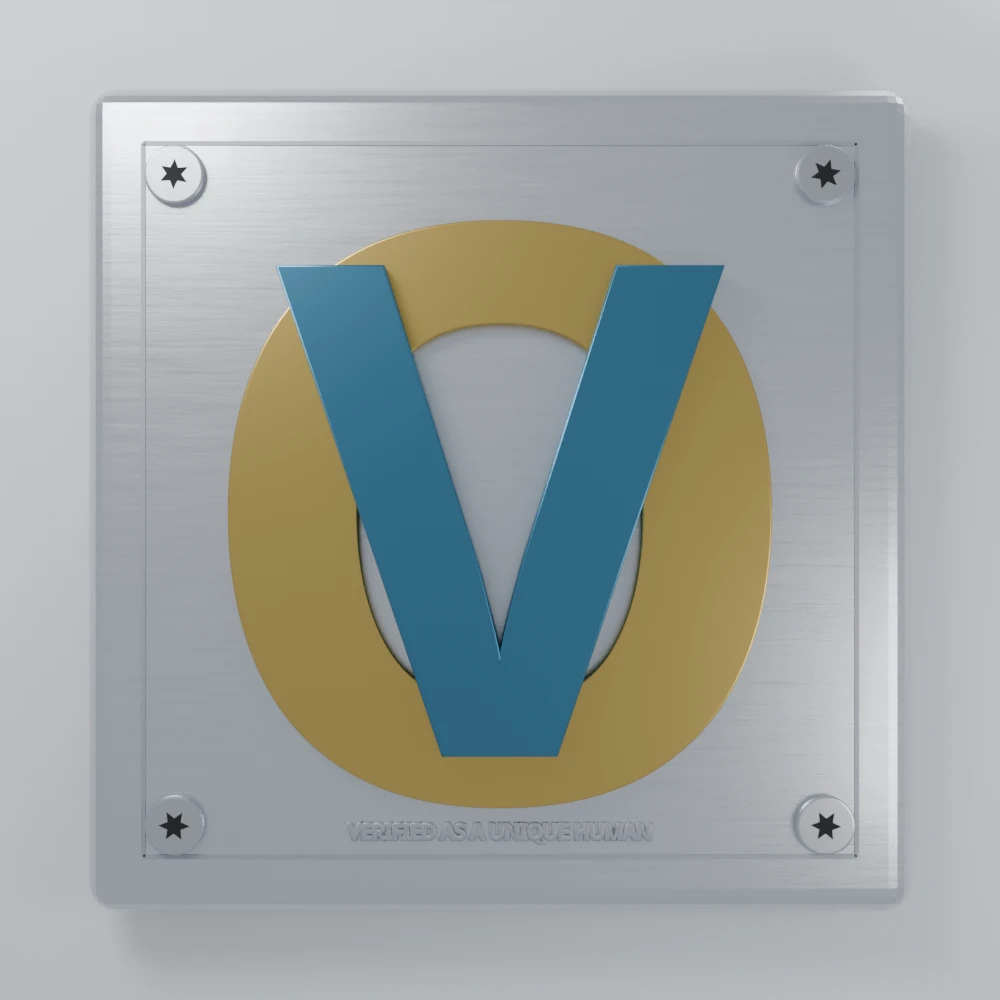 The Operator Verified plate: a brushed steel credential plate, gold O and deep steel blue V overlaid, the words ‘verified as a unique human’ engraved along the base